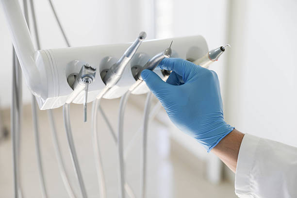 Professional Tooth Extraction technician working in Longbranch, WA